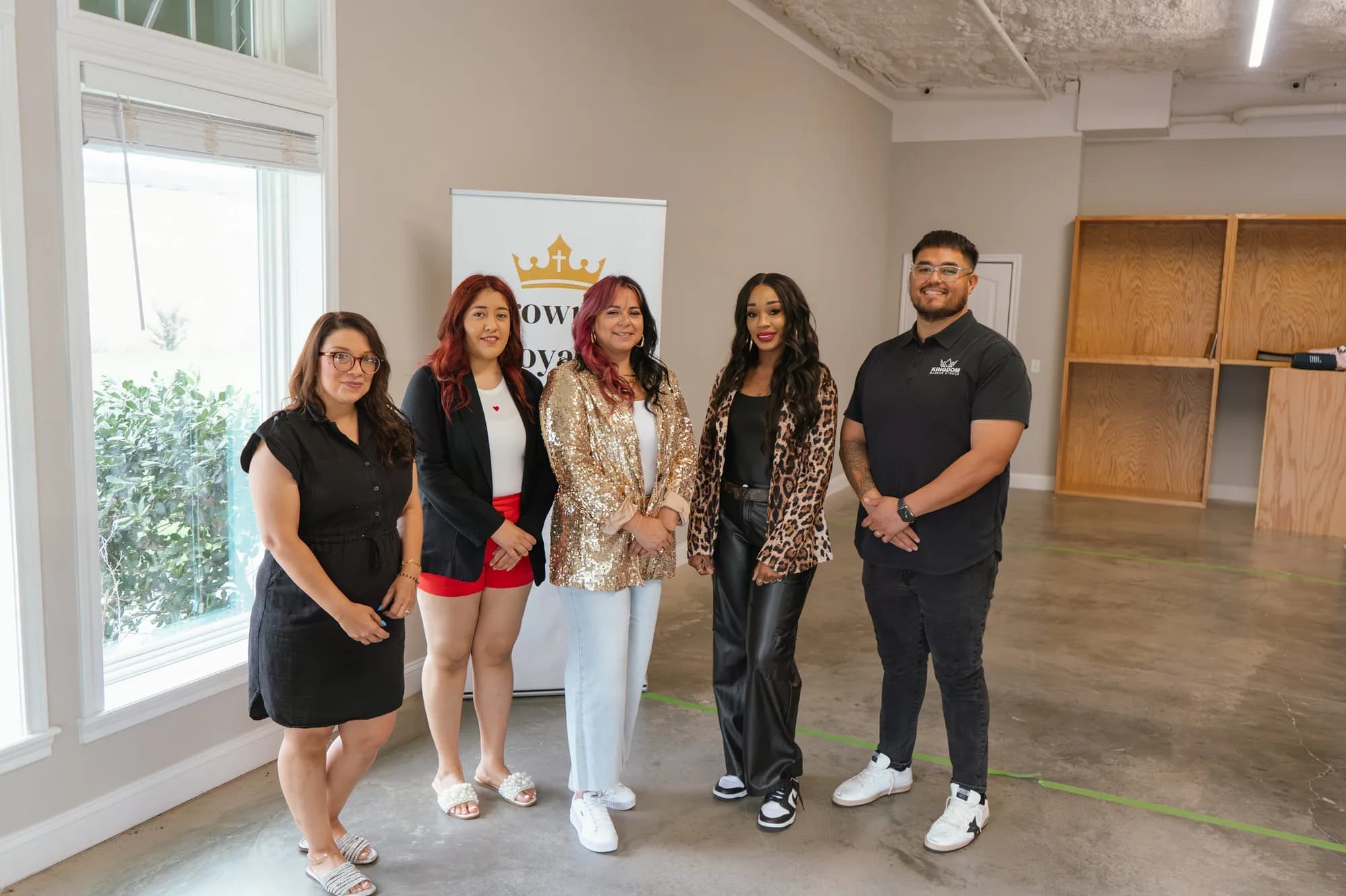 The Crowned Royalty Hair Institute team in the open studio